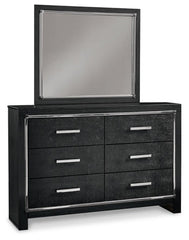 Kaydell King Upholstered Panel Headboard with Mirrored Dresser, Chest and Nightstand - furniture place usa