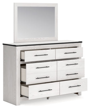 Schoenberg Queen Panel Bed with Mirrored Dresser - furniture place usa
