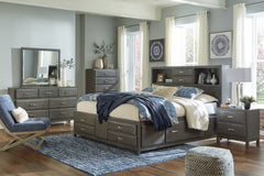 Caitbrook Queen Storage Bed with 8 Storage Drawers with Mirrored Dresser and 2 Nightstands - furniture place usa