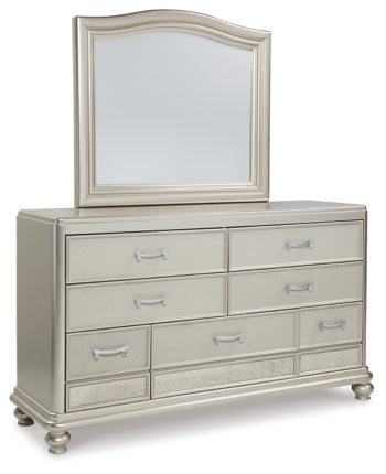 Coralayne Queen Upholstered Sleigh Bed with Mirrored Dresser and Chest - PKG007818 - furniture place usa