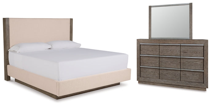 Anibecca Queen Upholstered Panel Bed with Mirrored Dresser - furniture place usa