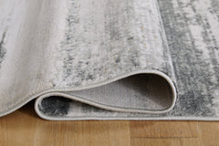 Abanett 5'3" x 7'3" Rug - furniture place usa