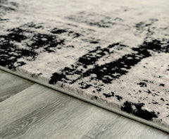 Zekeman 5'3" x 7'7" Rug - furniture place usa