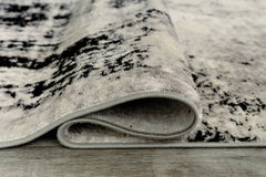 Zekeman 5'3" x 7'7" Rug - furniture place usa