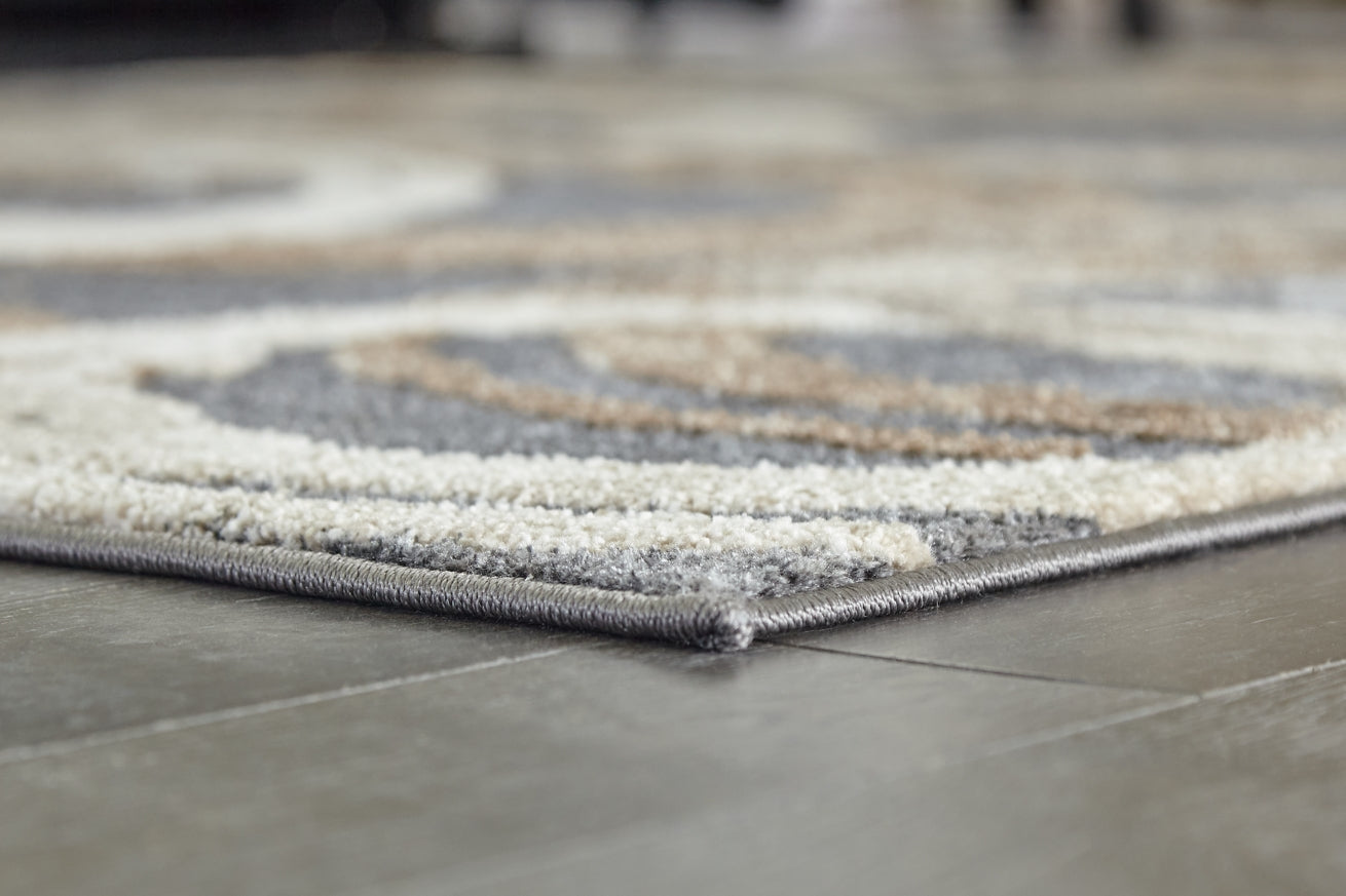 Faelyn 7'10" x 9'10" Rug - furniture place usa