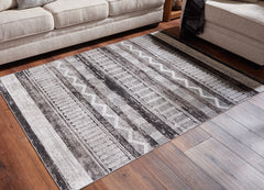 Henchester 5' x 7' Rug - furniture place usa