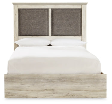 Cambeck King Upholstered Panel Bed with Mirrored Dresser and Chest - furniture place usa