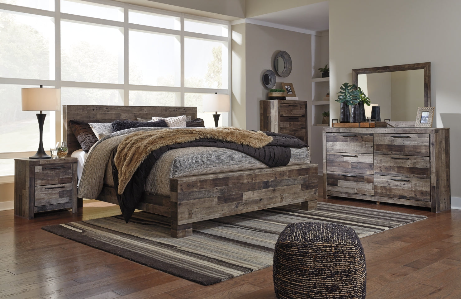 Derekson King Panel Bed with Mirrored Dresser, Chest and Nightstand - furniture place usa