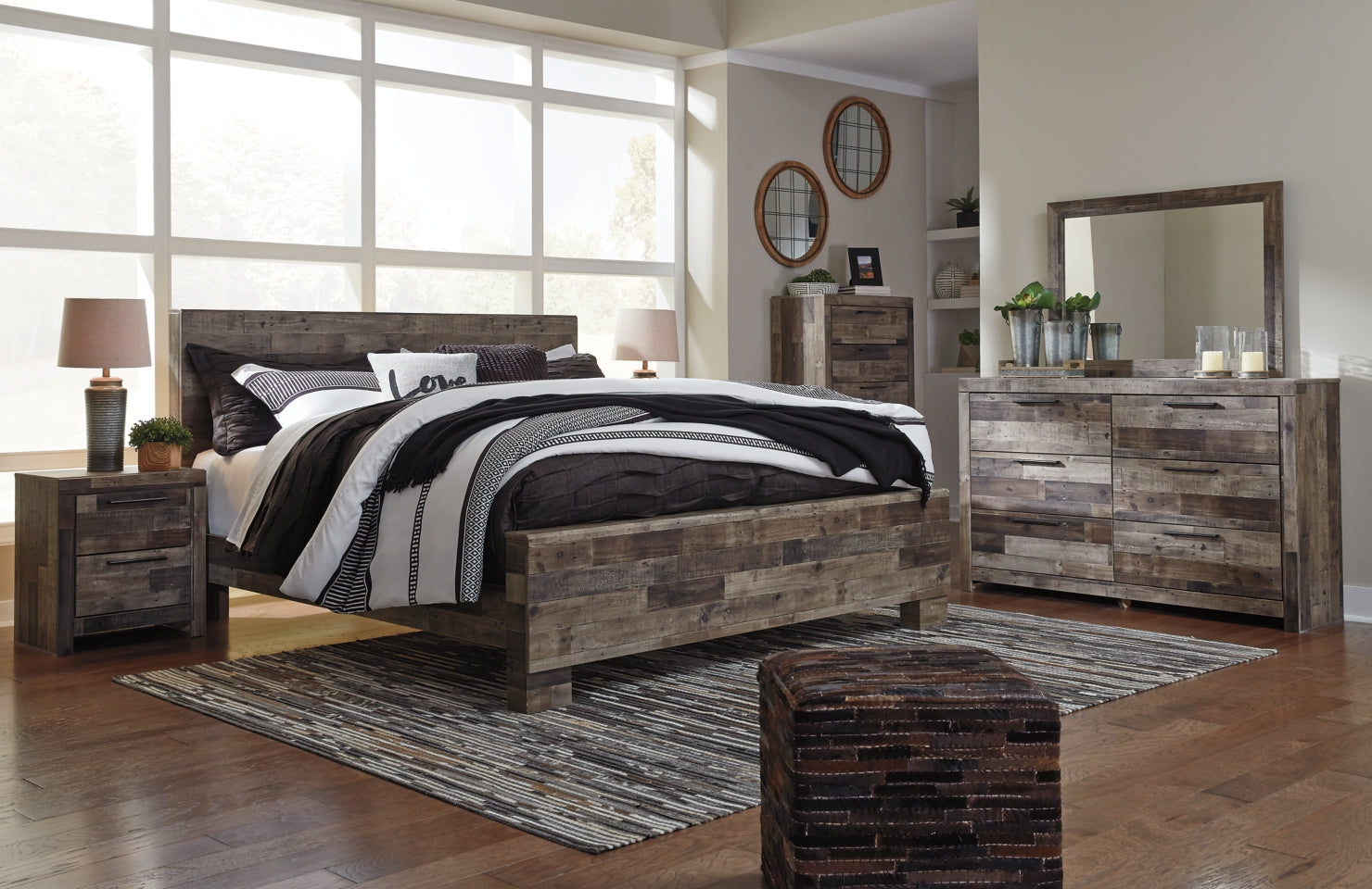 Derekson King Panel Bed with Mirrored Dresser, Chest and 2 Nightstands - furniture place usa