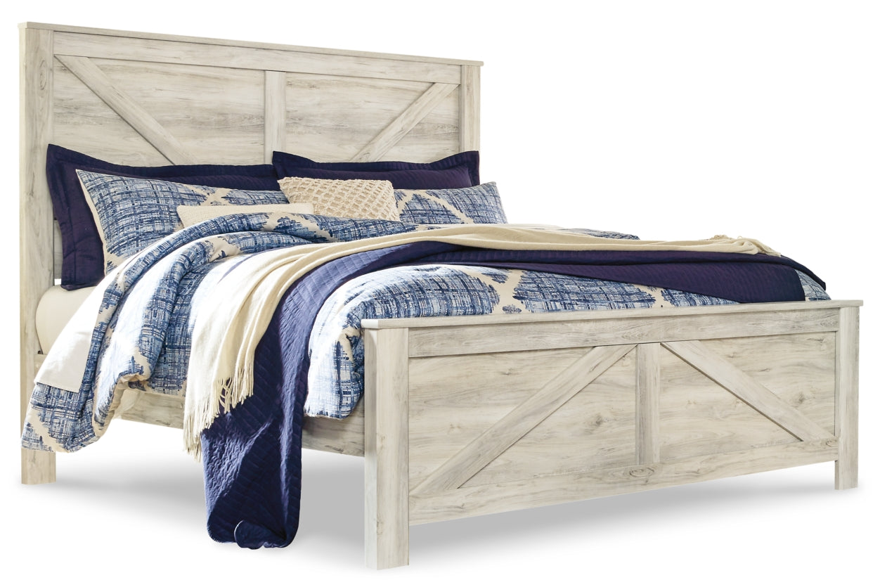 Bellaby King Crossbuck Panel Bed with Mirrored Dresser and Chest - furniture place usa