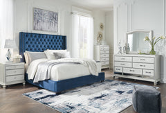 Coralayne California King Upholstered Bed with Mirrored Dresser and Chest - PKG010744 - furniture place usa