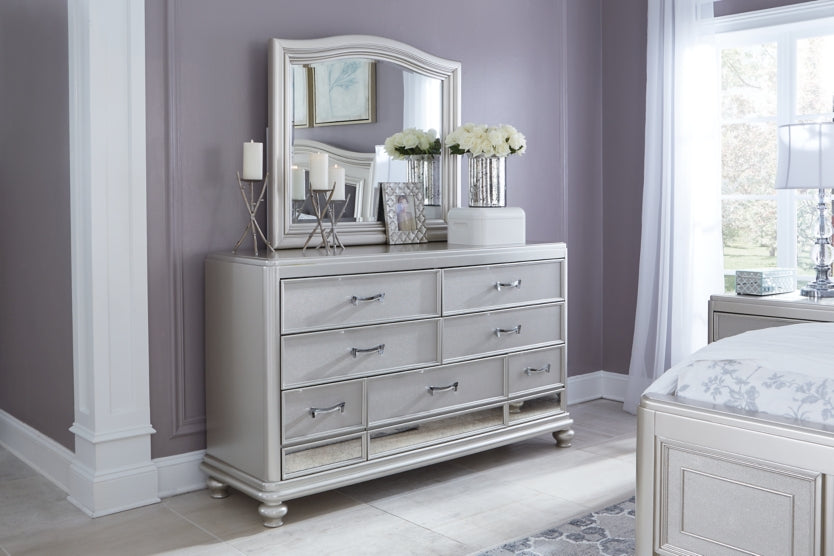 Coralayne King Upholstered Bed with Mirrored Dresser, Chest and 2 Nightstands - PKG007787 - furniture place usa