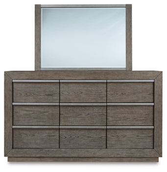Anibecca Queen Upholstered Panel Bed with Mirrored Dresser and Chest - furniture place usa