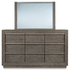 Anibecca Queen Upholstered Panel Bed with Mirrored Dresser and Chest - furniture place usa