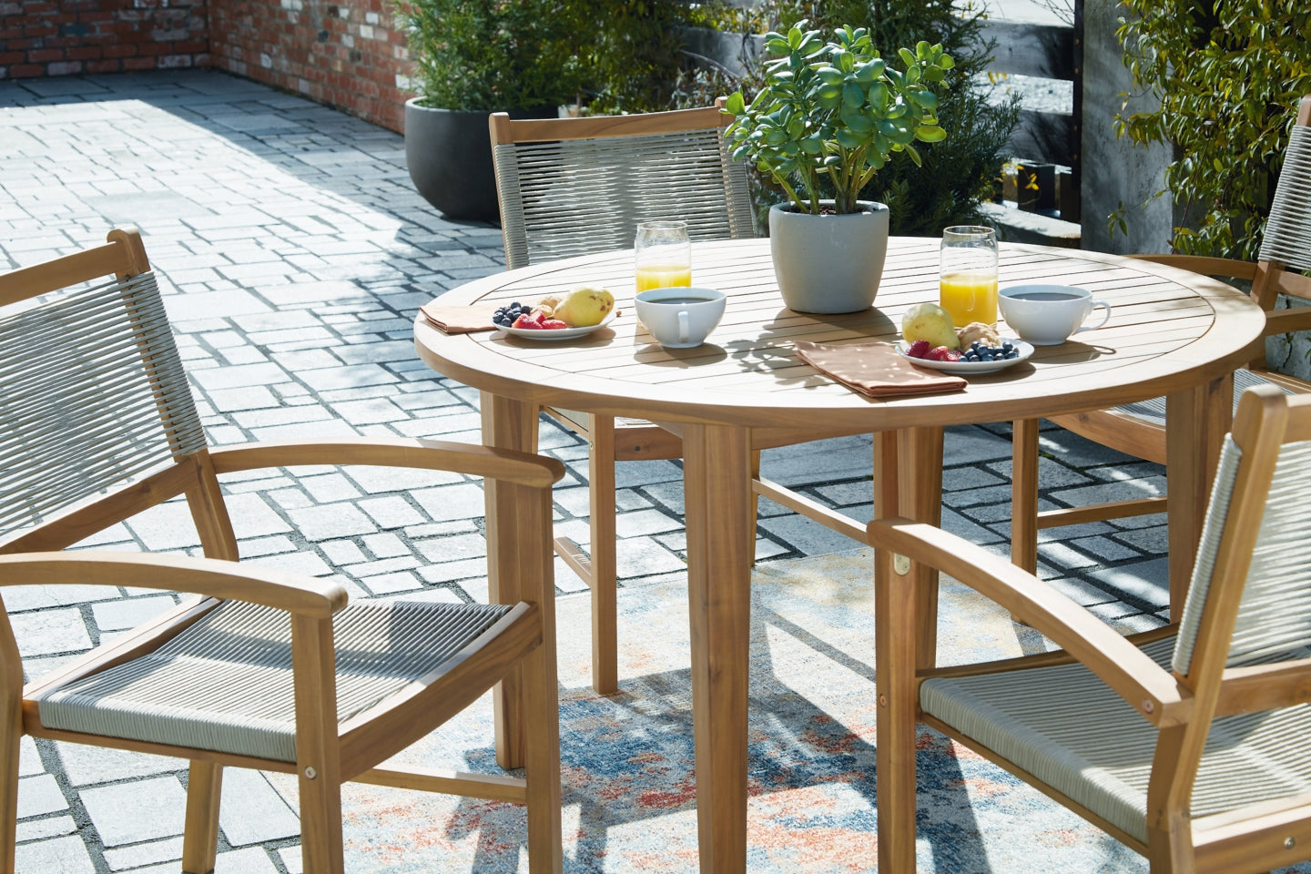 Janiyah Outdoor Dining Table and 4 Chairs - PKG013835 - furniture place usa