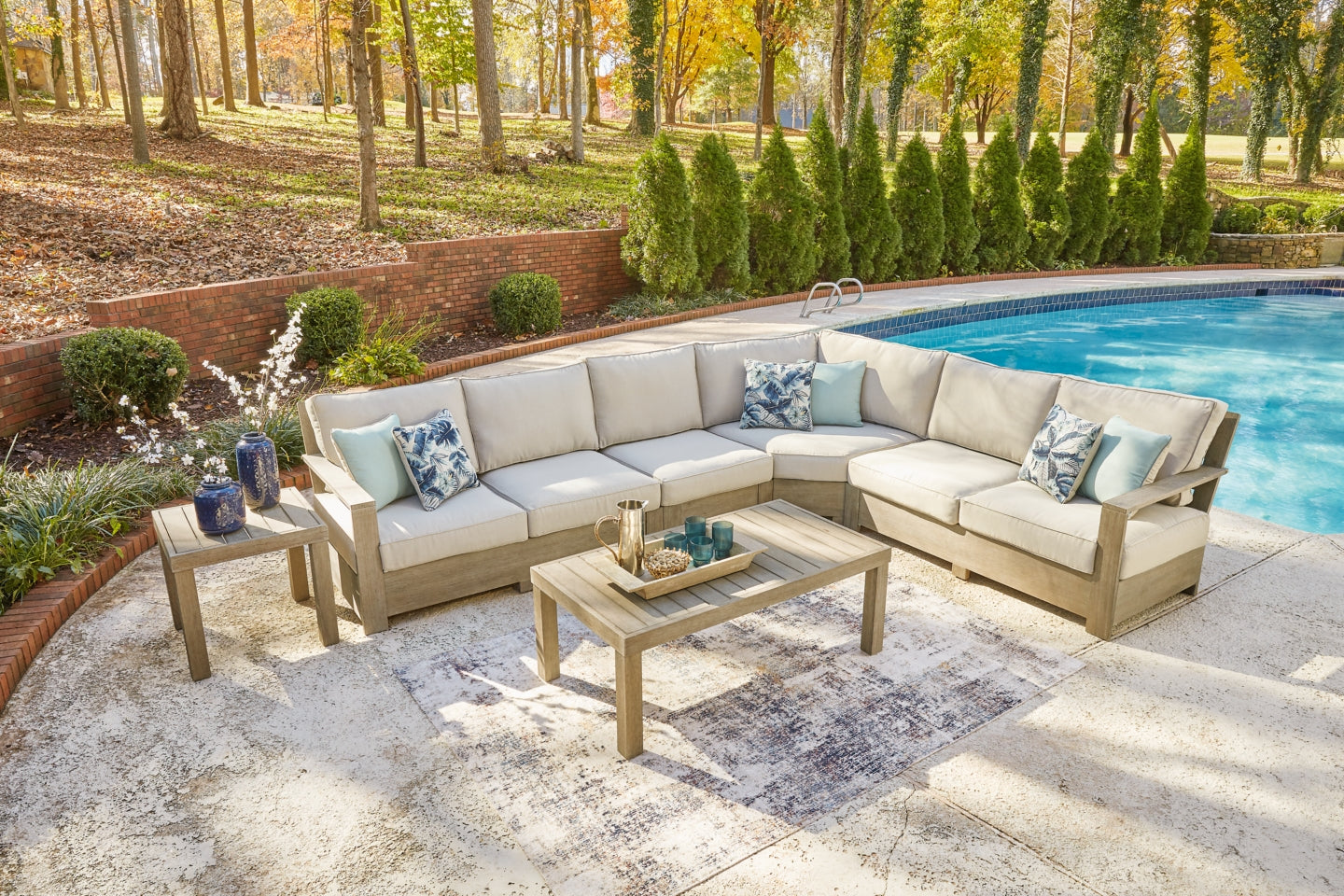 Silo Point 4-Piece Outdoor Sectional with Coffee Table and End Table - furniture place usa