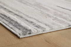 Abanett 5'3" x 7'3" Rug - furniture place usa