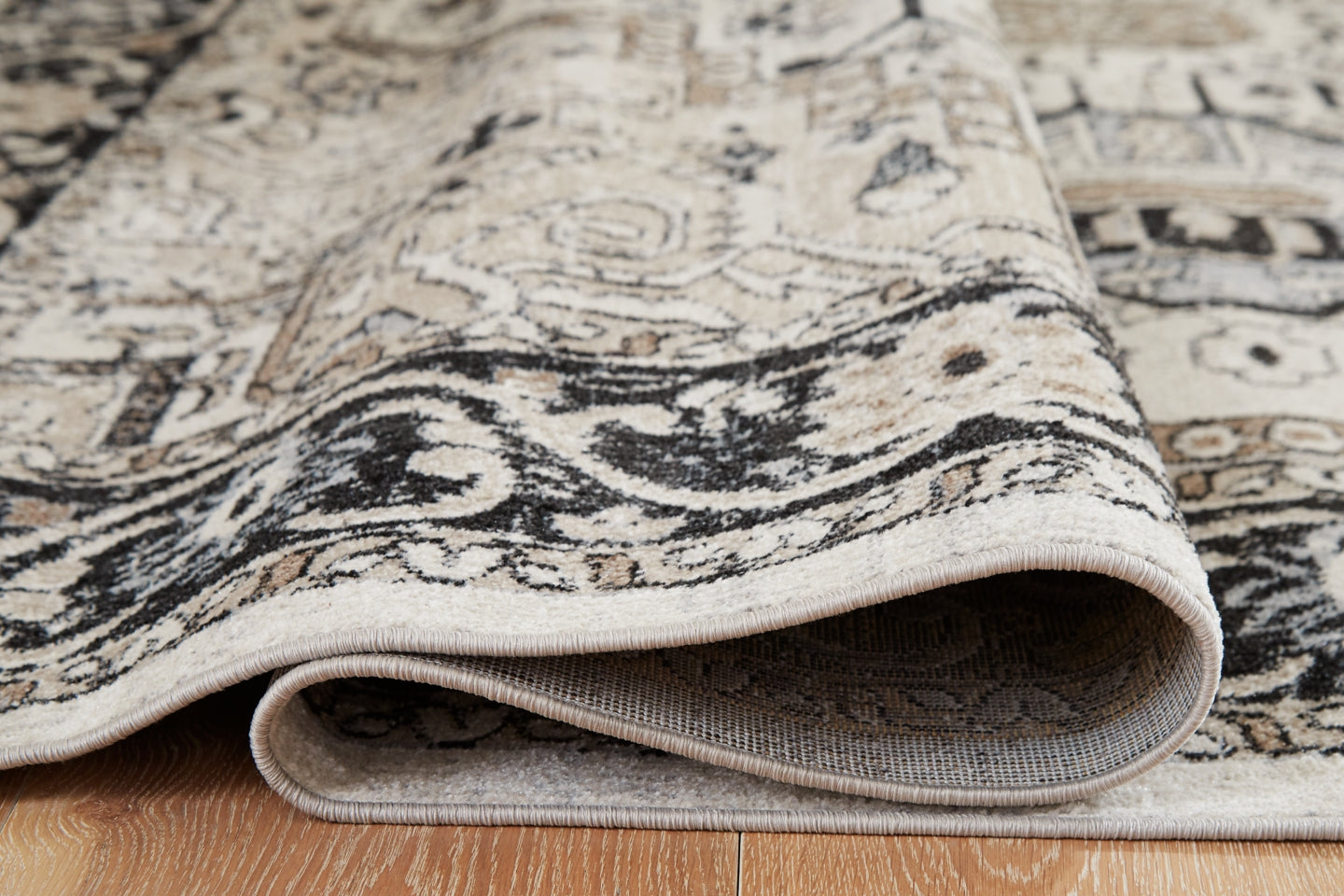 Gregmoore 5'2" x 6'10" Rug - furniture place usa